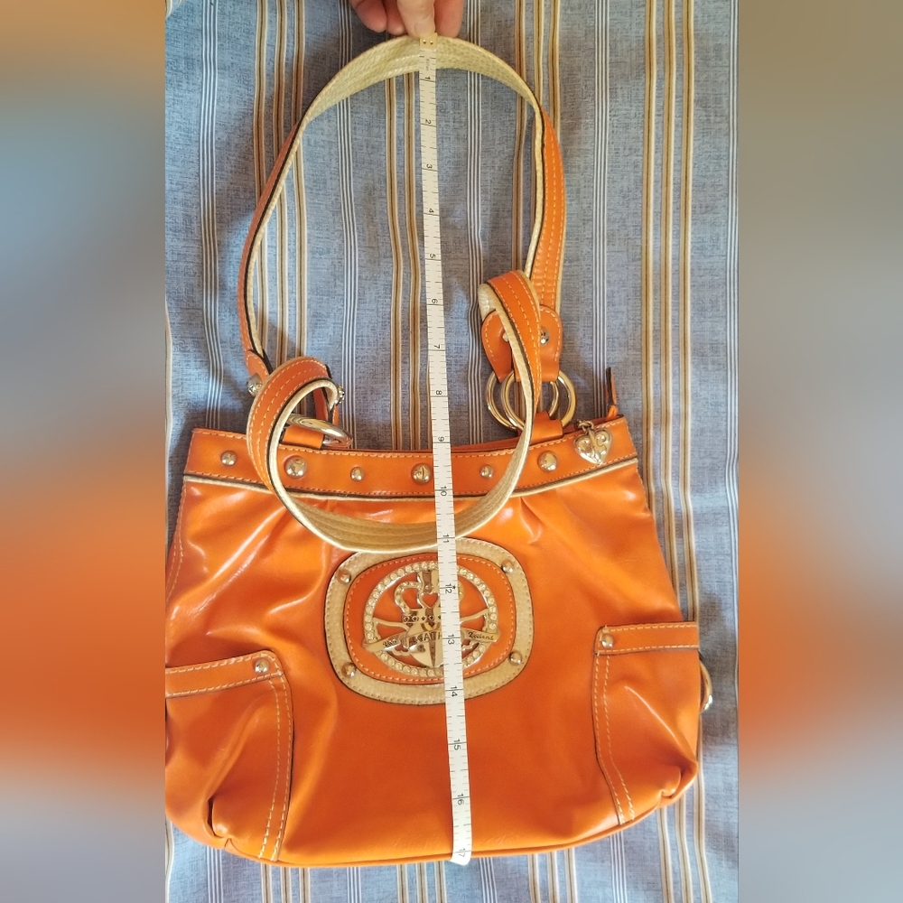 Kathy Van Zeeland purse. Orange